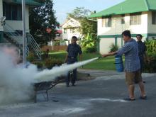 Practising Using the Fire Extinguisher